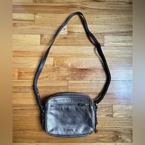 Metallic fossil shoulder bag